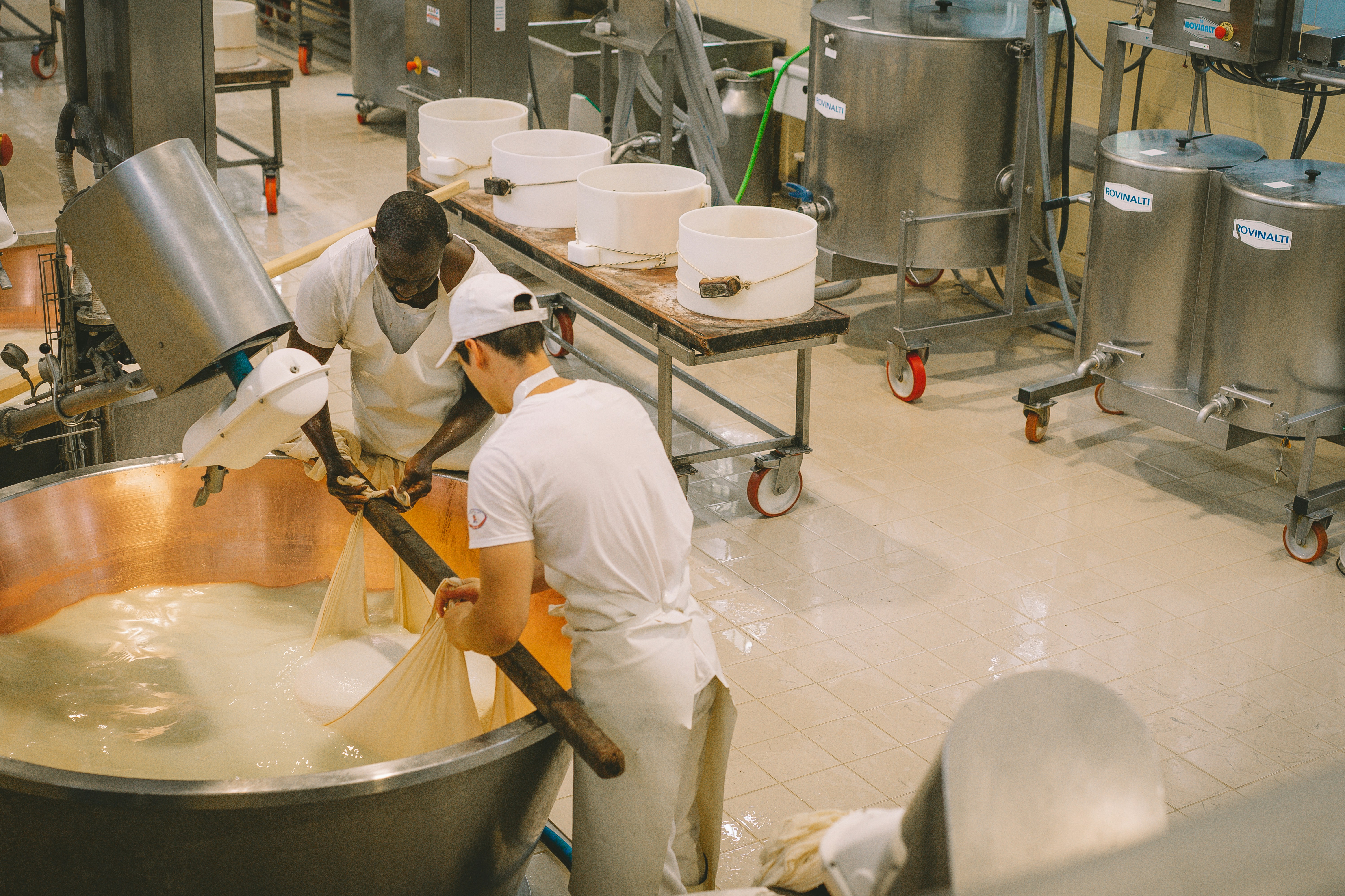 Workers in a food packaging and processing facility